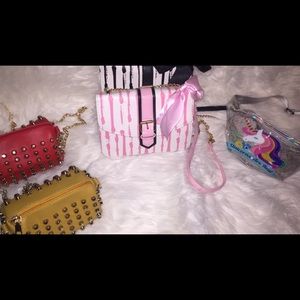 Different crossbody bags and unicorn fanny pack